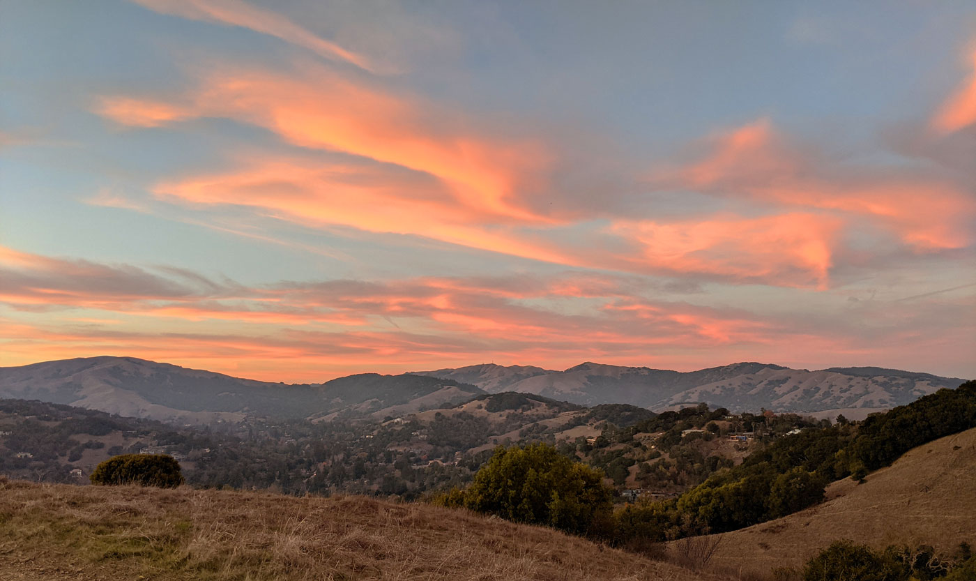 Photo of a sunset over hills